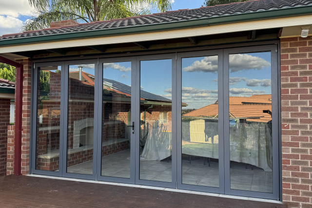 Create an open plan space with aluminium bifold doors. Tyndall's Glass Pty Ltd can manufacture a bifold door to suit any sized space.